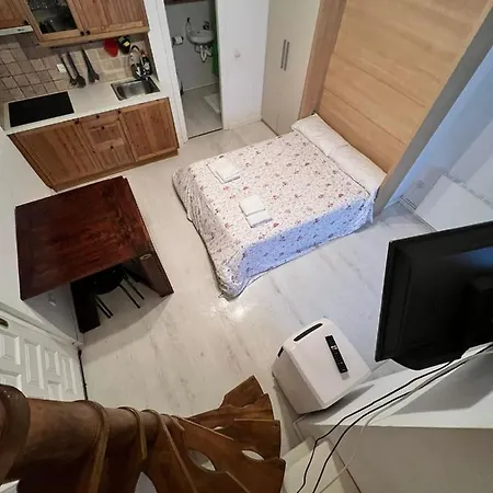 Acogedor En *
